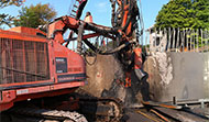 Pile reinforcement off a barge
